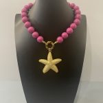 Collana maxi boules, collana viola amaranto, collana resina, ciondolo oversize stella marina, collana corta, resina italiana, per lei. Collane artigianali di Resina