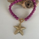 Collana maxi boules, collana viola amaranto, collana resina, ciondolo oversize stella marina, collana corta, resina italiana, per lei. Collane artigianali di Resina