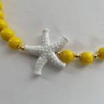 Collana da mare, collana gialla, collana girocollo con stella marina, collana resina, collana estiva, regalo ragazza, regalo per lei. Collane artigianali di Resina
