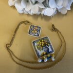 Ciondolo siciliano artigianale con due mattonelle di Caltagirone decorate con Limoni. Ciondoli artigianali siciliani