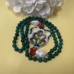 Collana artigianale siciliana con Anfora di ceramica di Caltagirone dipinta a mano e perle di Agata verde. Collane caratteristiche siciliane
