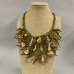 collana verde con charms marini