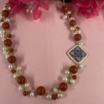 collana artigianale Caltagirone, pasta in corallo rosso e mattonella