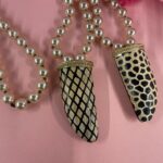 collana con perle maiorca e corno