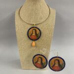 collana e orecchini artigianali con Santa chiara