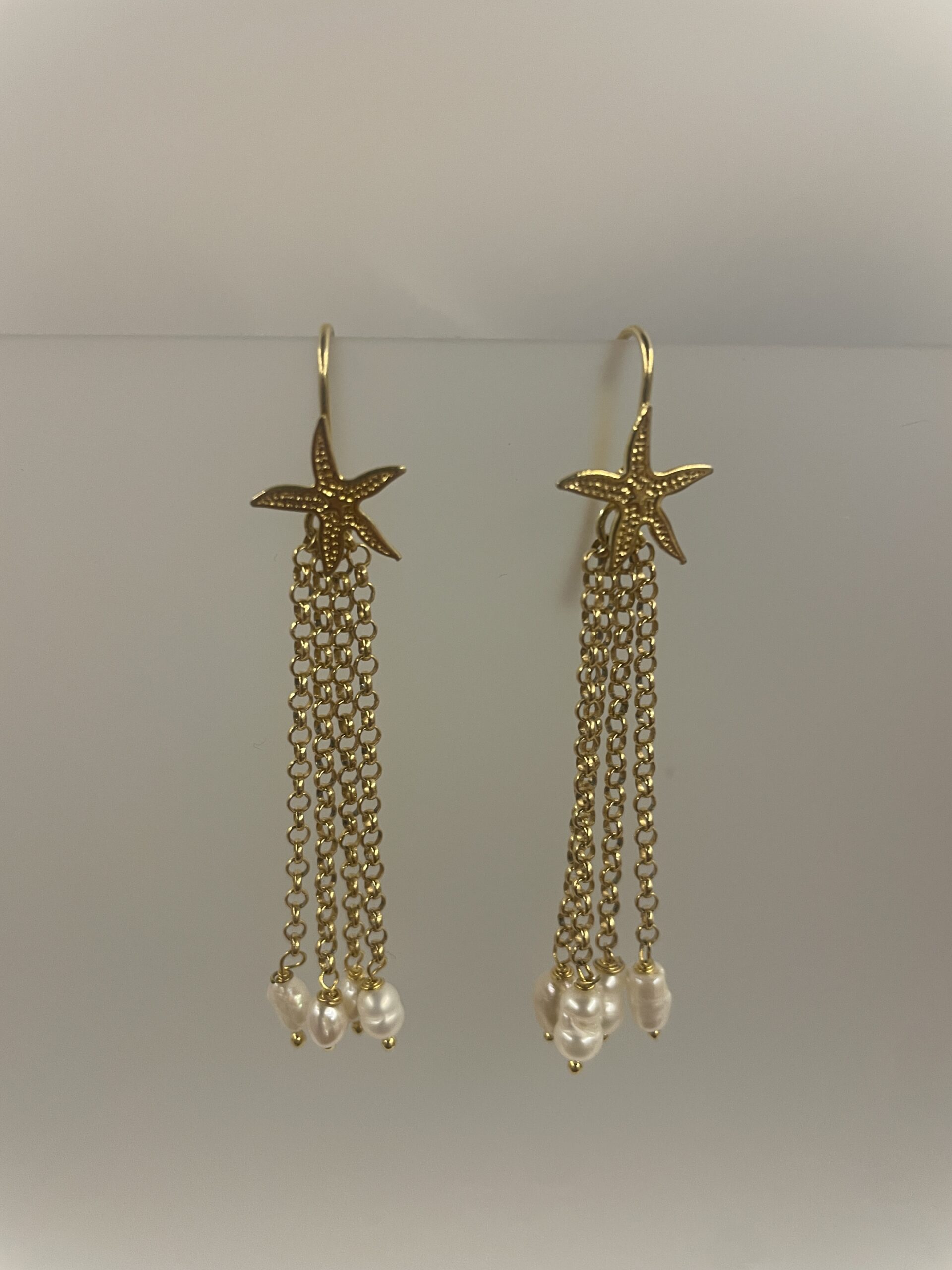 orecchini stella argento e 4 catene con perle di fiume